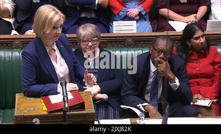 PMQsFirst PMQs for Liz Truss today 7.9.22 either side sat Penny Mordaunt and Therese Coffey   as she faced Keir Starmer  Alongside her new front bench Stock Photo