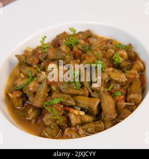 Bhindi masala or ladies finger fry served with indian roti chapati or Indian Flat bread Stock Photo