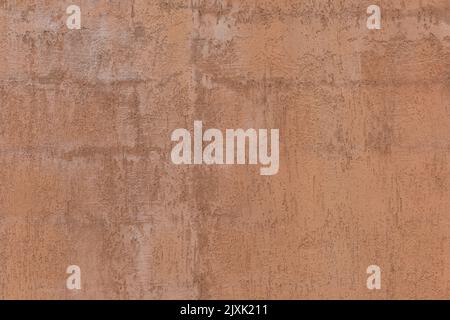 Texture cement wall painted in red. Rough Stock Photo