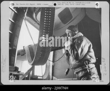 Waist gunners in a Consolidated B-24 Liberator, an American heavy ...