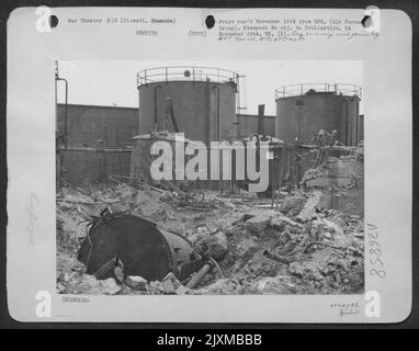 The wreckage of storage tanks at the Astra-Romano oil refinery at Ploesti. This refinery is the largest in Rumania, and one of the 15 at Ploesti attacked 23 times between April 5 and August 19, 1943 from the air. Stock Photo