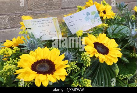 Flowers at Dunfermline Crematorium ahead of the funeral service of Rab Wardell. Wardell died after suffering a cardiac arrest while lying in bed with his partner, Olympic cyclist Katie Archibald, on August 23, days after winning the Scottish MTB XC Championships. Picture date: Wednesday September 7, 2022. Stock Photo