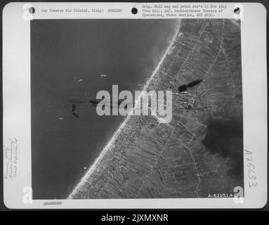 Bombing Of Enemy Defense Installations At Rimini, Italy, By Martin B-26 'Marauders' Of The 12Th Air Force. Stock Photo