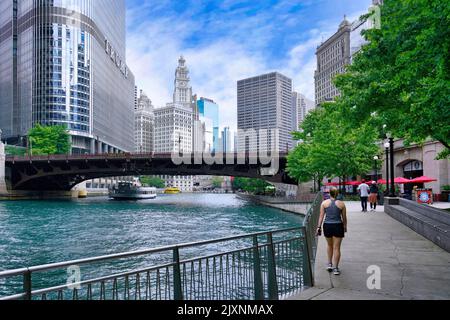 The Riverwalk along the Chicago River has benches and cafes and offers exercise with a view of diverse architecture. Stock Photo
