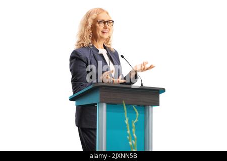 Professional woman giving a speech on a stand isolated on white background Stock Photo