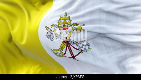 Close-up view of the Vatican national flag waving in the wind. The Vatican City is an independent city-state and enclave surrounded by Rome, Italy. Fa