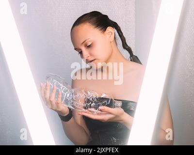 waste reuse plastic pollution volunteer bottle Stock Photo