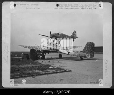 Pick-A-Back Plane -- Pictured Is The German Pick-A-Back Plane Captured By The 1St Us Army In Merseburg Airport, Germany. The Pilot Supposedly Controlled The Bomb Laden Ju 88 By Remote Control From A Fw-190 Attached Above. When Over The Target, The Ju 88 Stock Photo