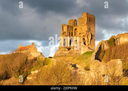 The remains of Scarborough Castle captured shortly before sunset in the spring. Stock Photo