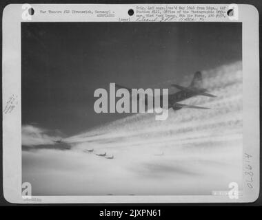 High In The Sub Stratosphere Over German Territory, This Boeing B-17 'Flying Fortress' Of The 91St Bomb Group 8Th Af Etches Vapor Trails. The Target On This Mission Is Brunswick, Germany. 30 Jan 1944. (Altitude 22,000 Feet). Stock Photo