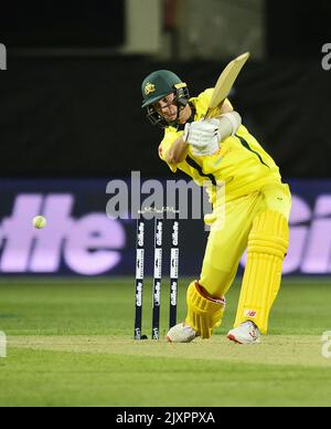 Pat Cummins of Australia plays a shot during the third One Day