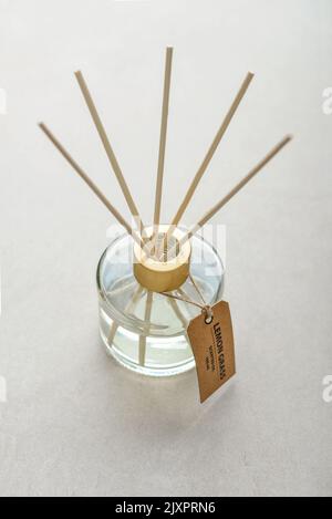 Fragrance diffuser for home on light concrete background close up Stock Photo