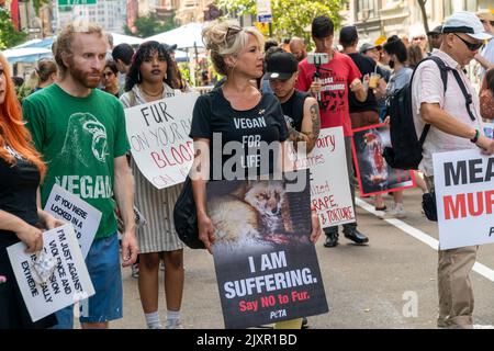 Animal Rights advocates, from anti-carriage horse activists to vegans, and everyone in between, gather in Flatiron Plaza in New york for the Animal Rights March on Saturday, August 27, 2021.  (© Richard B. Levine) Stock Photo