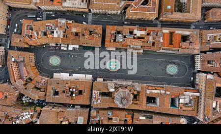 Aerial Stock Footage of a Bird's Eye View Flying Over Piazza Navona and city streets at day in Rome, Italy Stock Photo