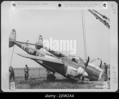 A Hoist Is Hooked To The Lockheed P-38 (A/C 42067980) Of The 364Th Fighter Group, 67Th Fighter Wing, Which Made A Crash Landing At 8Th Air Force Station F-375, Honnington, England. 30 May 1944. Stock Photo