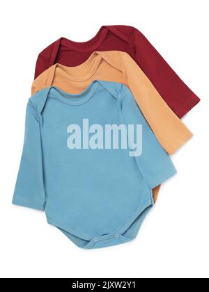 Three multi-colored children's bodysuits with long sleeves isolated on a white background Stock Photo