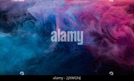 ink in water colorful background blue pink haze Stock Photo