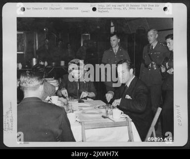 Bob Hope, Frances Langford And The Show Troupe Enjoy A Gi Meal In The 70Th Service Group Mess Hall During Their Visit To The Base On 2 July 1944. England. Stock Photo