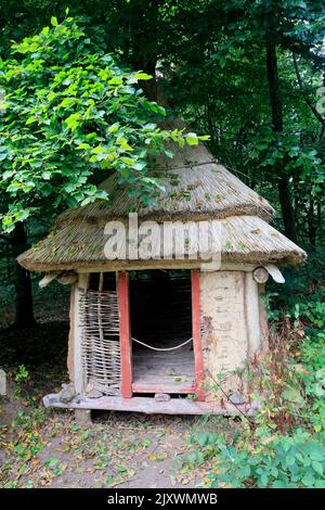 Small food store /grain store at Bryn Eryr Iron Age Roundhouses, St Fagans National History Museum. Summer 2022. August. Stock Photo