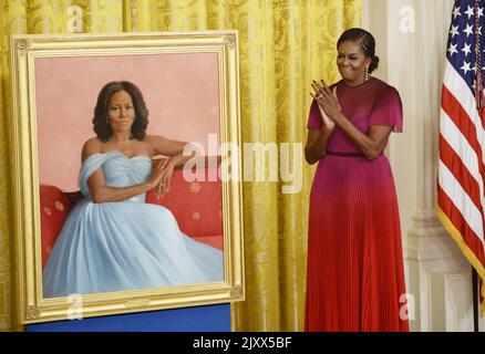 Washington, United States. 07th Sep, 2022. Former First Lady Michelle Obama applauds as she and former President Barack Obama unveil their official portraits in the East Room of the White House in Washington, DC on Wednesday, September 7, 2022. The portraits of the former president and first lady were painted by Robert McCurdy and Sharon Sprung, respectively. Photo by Bonnie Cash/UPI. Credit: UPI/Alamy Live News Stock Photo