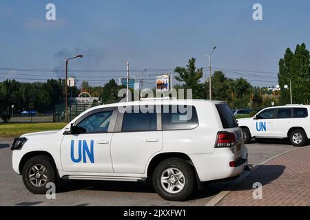 Vehicles of the team of IAEA experts and inspectors are seen at the hotel parking as the IAEA team prepares visit the Zaporizhzhia nuclear power plant. The UN's nuclear watchdog has called for the creation of a security zone around the Zaporizhzhia plant on the frontline of Russia's war in Ukraine. The International Atomic Energy Agency said that it is “still gravely concerned” about the safety and security of Europe's biggest nuclear power plant, the Zaporizhzhia facility situated in the midst of intense fighting between Ukrainian and Russian forces in southern Ukraine. Stock Photo