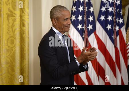 Washington, United States. 07th Sep, 2022. Former President Barack Obama applauds as former First Lady Michelle Obama speaks after unveiling their official portraits in the East Room of the White House in Washington, DC on Wednesday, September 7, 2022. Photo by Bonnie Cash/UPI Credit: UPI/Alamy Live News Stock Photo