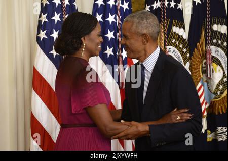 Washington, United States. 07th Sep, 2022. Former President Barack Obama and former First Lady Michelle Obama embrace after unveiling their official portraits in the East Room of the White House in Washington, DC on Wednesday, September 7, 2022. Photo by Bonnie Cash/UPI Credit: UPI/Alamy Live News Stock Photo