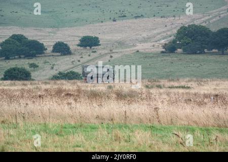 British army MAN HX60 4x4 Utility Truck in action on a military exercise Stock Photo