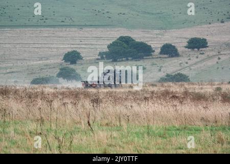 British army MAN HX77 SV 8x8 EPLS Heavy Utility Truck in action on a military exercise Stock Photo