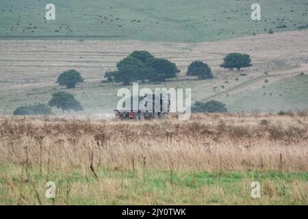 British army MAN HX77 SV 8x8 EPLS Heavy Utility Truck in action on a military exercise Stock Photo