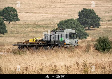 British army MAN HX58 6x6 Heavy Utility Truck EPLS in action on a military exercise Stock Photo