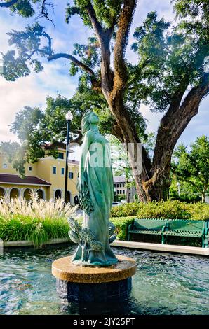 A statue of Daphne, a naiad in Greek mythology, stands in the fountain in front of Daphne City Hall, Sept. 4, 2022, in Daphne, Alabama. Stock Photo