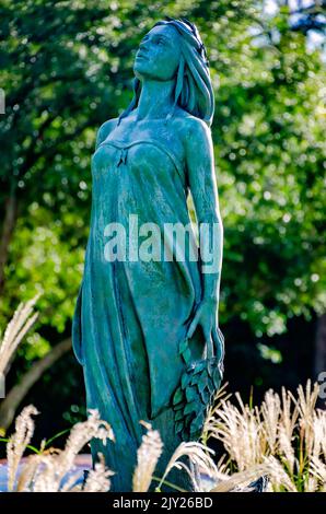 A statue of Daphne, a naiad in Greek mythology, stands in the fountain in front of Daphne City Hall, Sept. 4, 2022, in Daphne, Alabama. Stock Photo