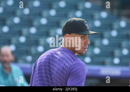 Colorado Rockies shortstop Alan Trejo (13) crosses home plate