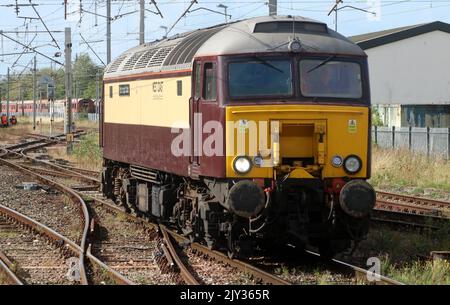 West Coast railway company class 57 diesel-electric loco 57313, Scarborough Castle, approaching Carnforth station platform 2 on 7th September 2022. Stock Photo