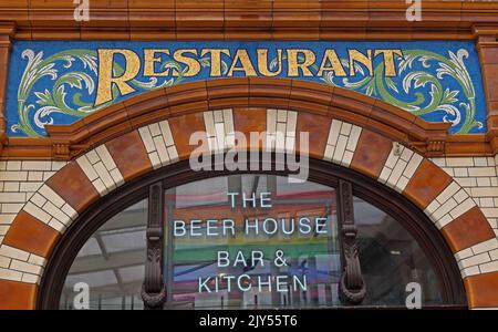 Victoria station Manchester, restaurant mosaic lettering, bookstall with mosaic decoration, Restaurant Stock Photo