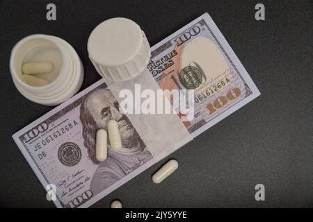 Medical business or prices concept. Making money in pharmaceutical industry or high medical expenses. Also drug dealing, dealer or trade. Stock Photo