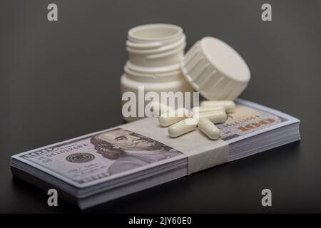 Medical business or prices concept. Making money in pharmaceutical industry or high medical expenses. Also drug dealing, dealer or trade. Stock Photo
