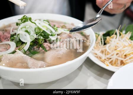 A bowl of beef pho (Phở Bò) at Pho Tau Bay, one of the oldest Vietnamese restaurants in Cabramatta — Sydney, Australia Stock Photo