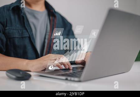 Big data analytics and business intelligence concepts. Financial charts are displayed on an computer display. Stock Photo