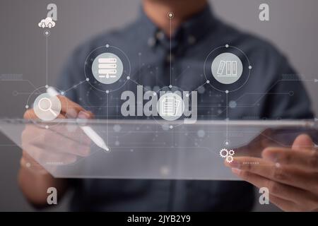 Electronic document icons on a virtual screen for a document management idea and data system for business. Stock Photo