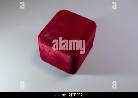 Red box for jewelry. Isolated on grey Stock Photo