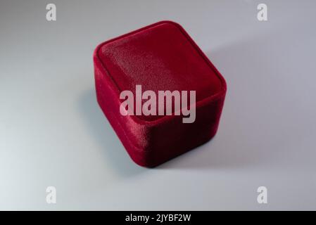 Red box for jewelry. Isolated on grey Stock Photo