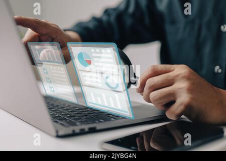 Financial audit research online on a computer laptop. Web analytics or web analysis, a digital report, an accounting or sales finance concept, a marke Stock Photo