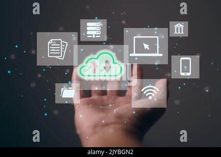 Database data can be moved to the Cloud with help from this technology. Integrated digital web on hand concept. Stock Photo