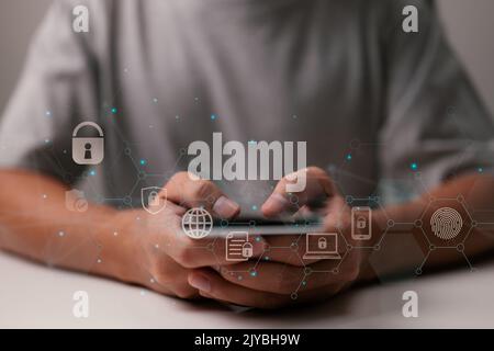 Man use smartphone. Online data protection and information cyber security concept. Stock Photo