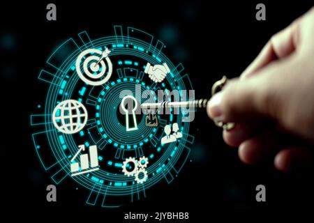 Hand with key. Key Performance Indicator (KPI) with icons for business, teamwork, target, growth. Key to success. Stock Photo