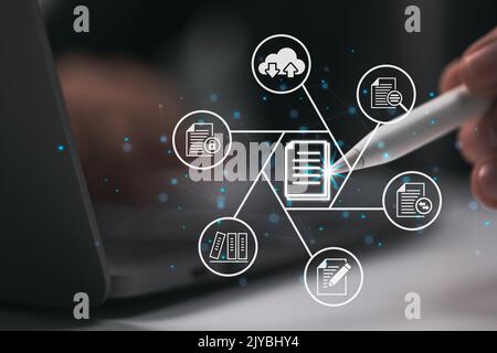 Corporate files and information are housed, searched, and managed by a Document Management System (DMS). Stock Photo