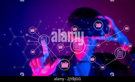DMS stands for Document Management System. On VR, an information technology (IT) consultant works. Concept of Internet Technology. Software that autom Stock Photo