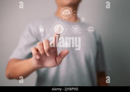 Online transactions, Businessman touching fingerprint scan gives security interface payment shopping banking and cloud computing network connection on Stock Photo